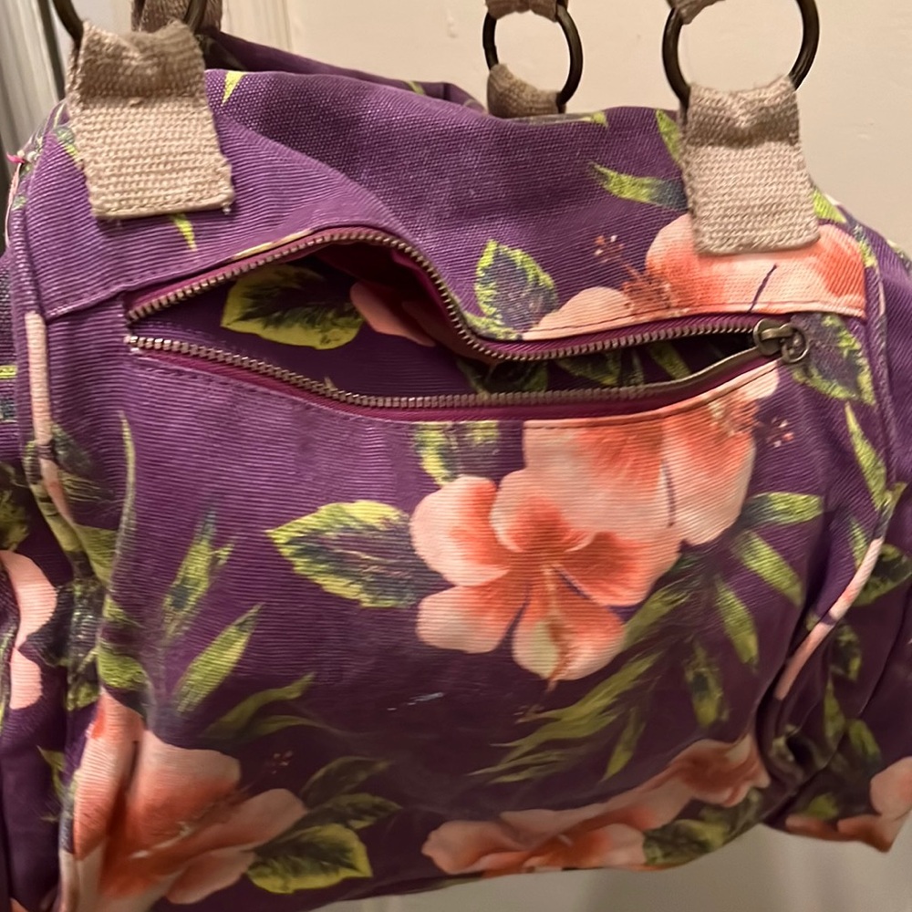 Purple flower over the shoulder carry-on